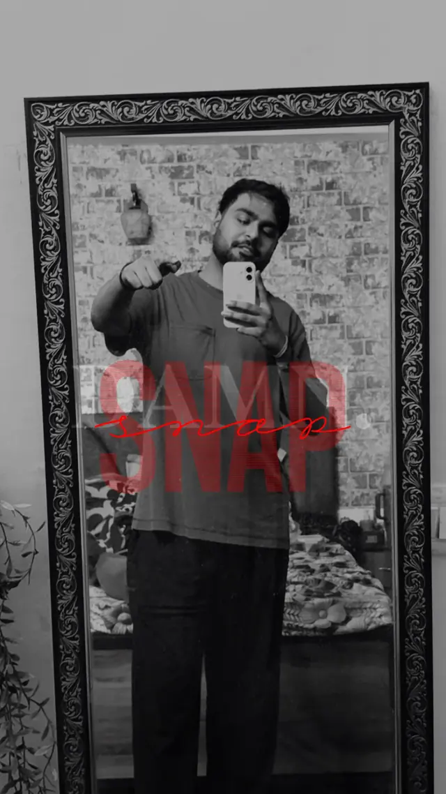 A black and white mirror portrait